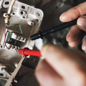 electrician-working-house-repair-installation-scaled
